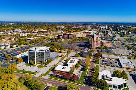A cityscape with buildings and roads.