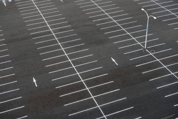 an aerial view of an empty parking lot