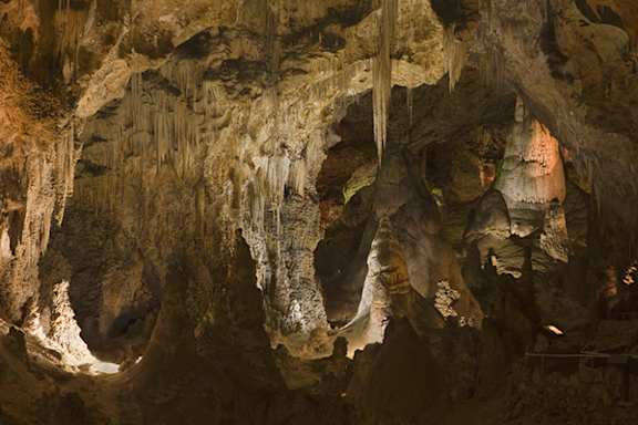 A cave with stalactites and stalagmites.