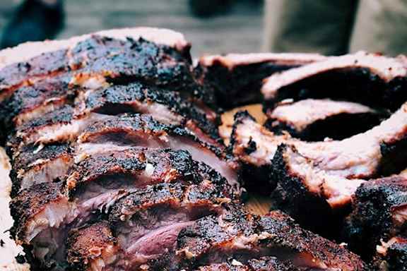 A close up of sliced barbecued ribs.