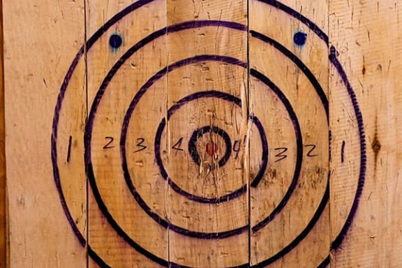a target drawn on a piece of wood
