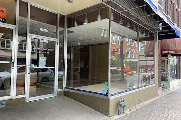 a view of the front of the building from the sidewalk