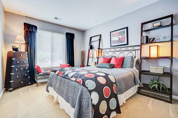 Furnished Bedroom with Carpeting at Polo Run Apartments, Greenwood, IN 46142