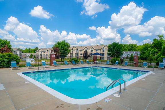 Poolside Lounge Chairs and Tables at Trillium Pointe Apartment Homes, Jackson 49201