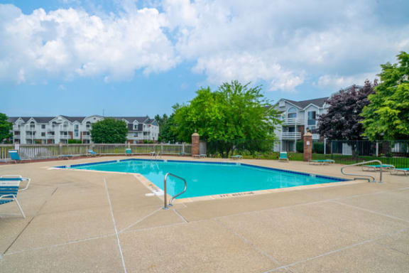 Outdoor Swimming Pool and Large Sundeck at Windmill Lakes Apartments, Holland, Michigan 49424