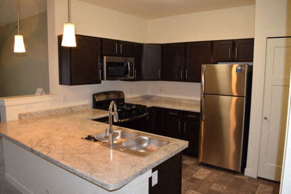 Stainless Steel Kitchen Appliances at The Reserve Apartment Homes in Grimes, Iowa