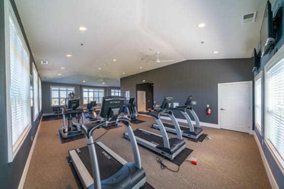 24-hour Fitness Center inside Community Building at The Reserve at Destination Pointe apartments, Grimes, IA 50111