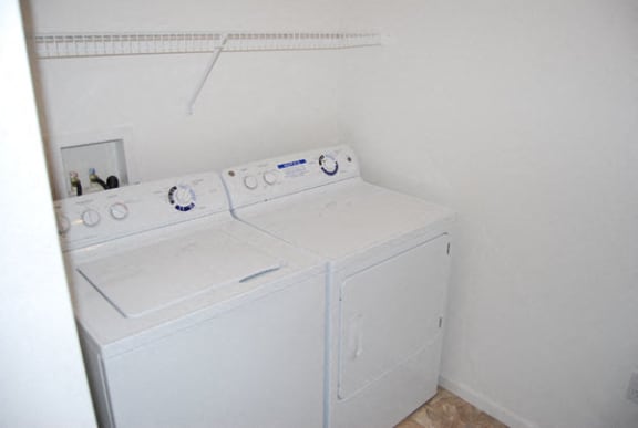 Convenient Laundry Room at Heatherwood Apartments in Grand Blanc, MI