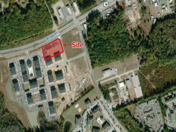 a screenshot of a google maps image of a site with a red rectangle on it