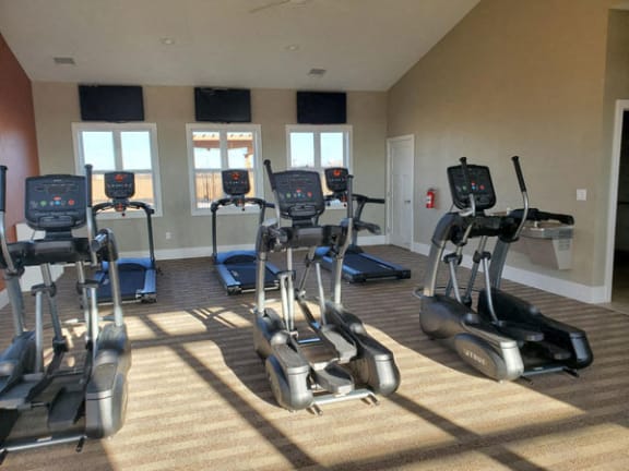 24-hour Fitness Center at Copper Creek Apartment Homes in Maize, KS