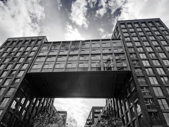 a black and white photo of a tall building