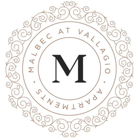 the logo of a wedding invitation with the letter m on a white background