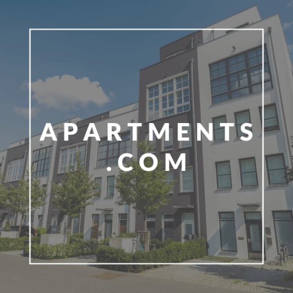an image of a building with the words apartments com over it