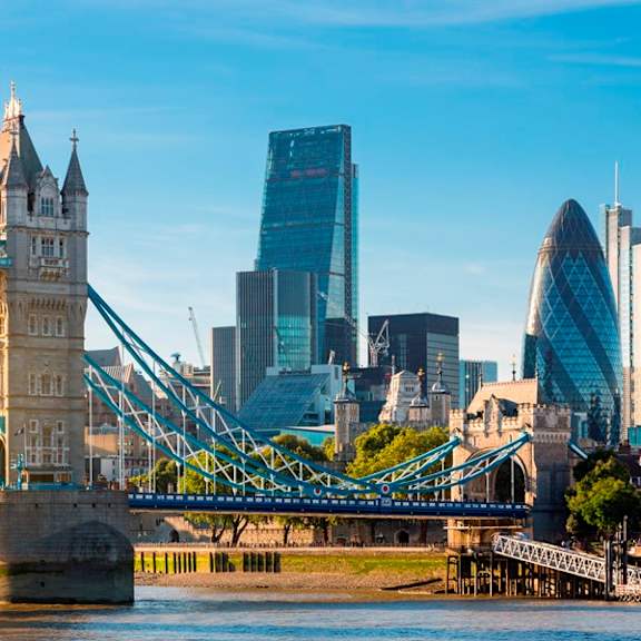 a view of the city and the tower bridge and skyscrapers
