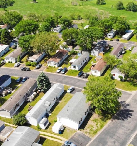 an aerial view of an apartment building in a city