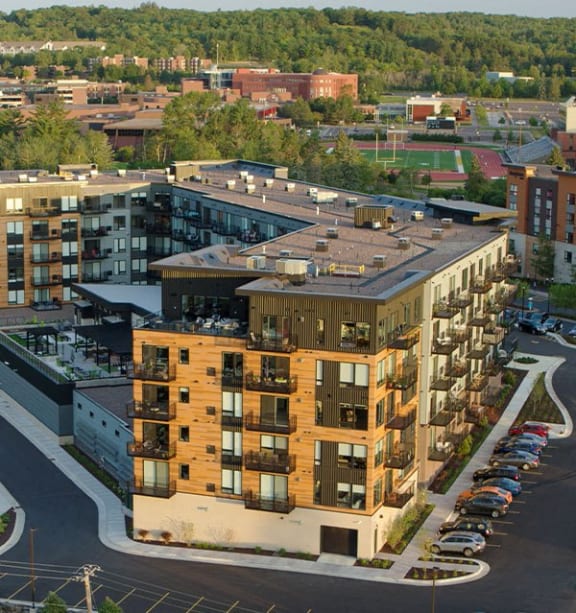 an aerial view of an apartment building in a city