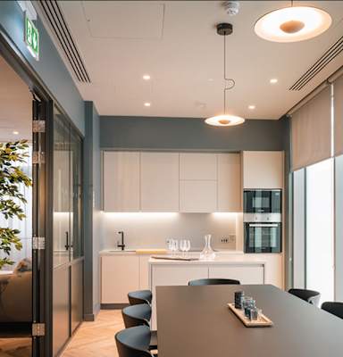 A modern kitchen with a dining table and chairs at Cherrywood Apartments, D18 VY3V, DUBLIN 18