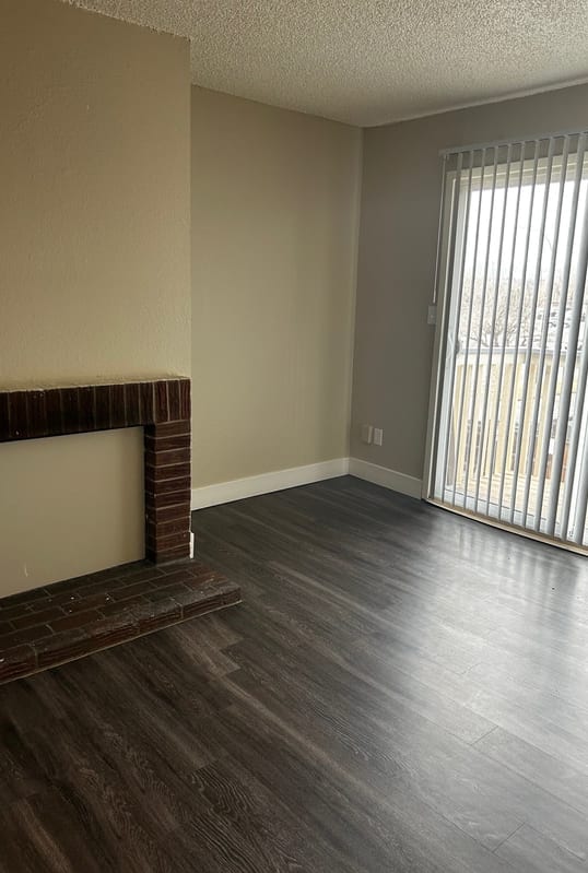 a kitchen and dining room with a table and chairs