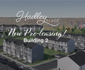 an aerial view of a row of houses with the words holy blessing building 2 overlaid at Hadley Place Apartments, Pennsylvania