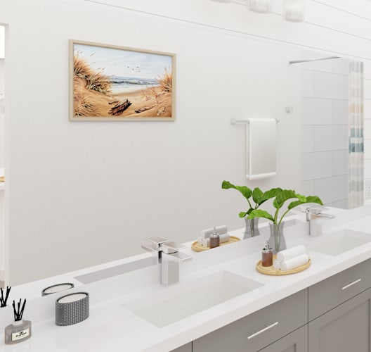 A bathroom with a white sink, toilet, and shower.
