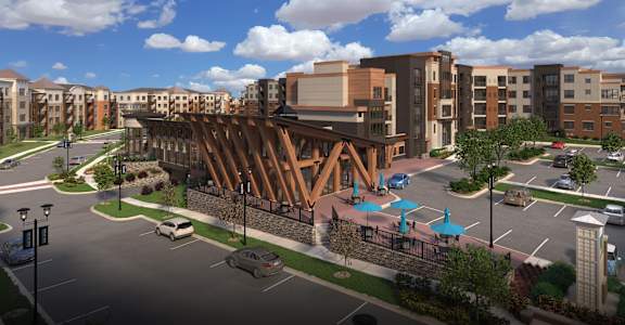 a rendering of a building with a bridge over a city street