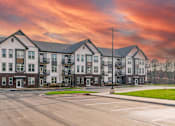 Thumbnail 20 of 20 - The exterior of a Nook Nine building at dusk in Indianapolis, IN 46240