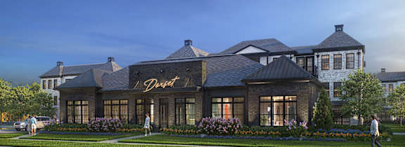 A building with the word "Dover" written on it is surrounded by people.