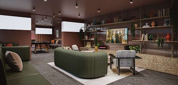 a living room with brown walls and a green couch