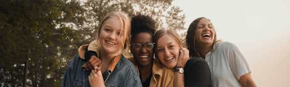 a group of young women posing for a picture