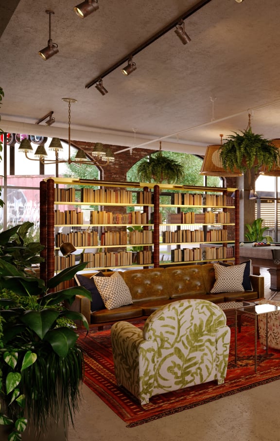 a lobby of a hotel with a reception desk and a library