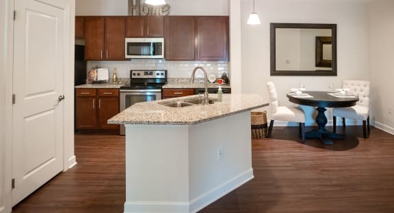 Galley Kitchen with Granite Countertops