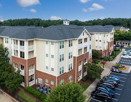 Exterior View of Allister North Hills Featuring On-Site Resident Surface Lot Parking in Raleigh, NC