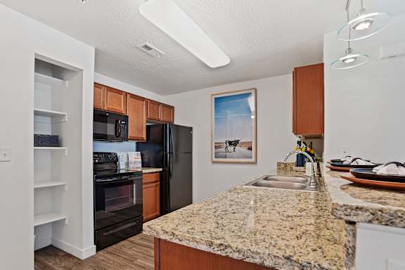 Kitchen with sink and faucet at The View on 20th, Ogden, Utah