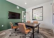 Thumbnail 6 of 28 - A conference room with a large table and chairs. at Siena Villas Apartments, Orem, UT, 84097