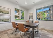 Thumbnail 12 of 28 - A conference room with a table and chairs. at Siena Villas Apartments, Orem, 84097