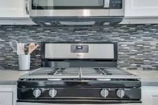 premium white finish style appliances and backsplash