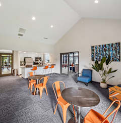 A room with a table and chairs in it.
