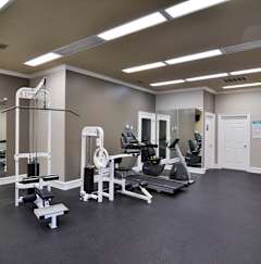 A spacious gym with a variety of equipment at Austin Chase Apartments, Macon