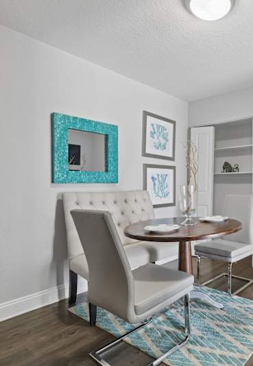 Upgraded kitchen with stainless steel appliances at Belara Lakes Apartments