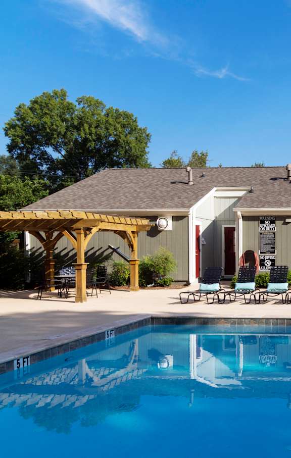 A house with a pool in front of it. at Westbury Creek, Augusta