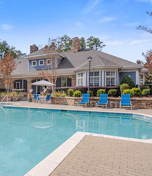 Pool with lounge chairs at Notting Hill Chapel Hill apartments