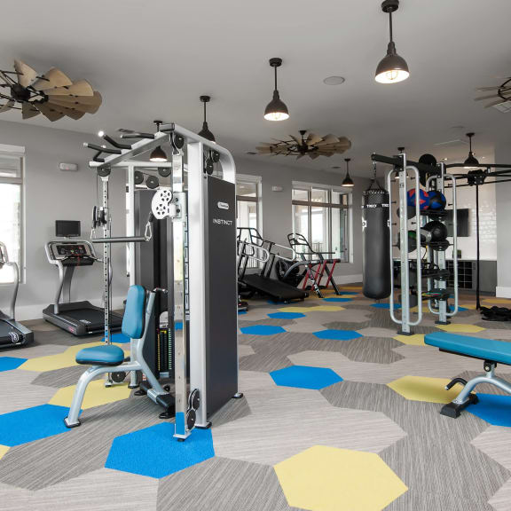 Gym with weight and cardio equipments at The Kelley at Samuels Ave, Fort Worth, TX