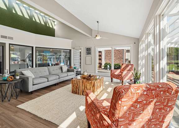 a living room with a couch and a table