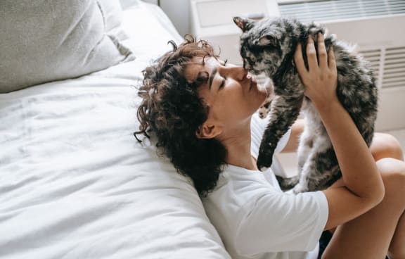 Woman with Happy Dog at Union Heights Apartments, Colorado Springs