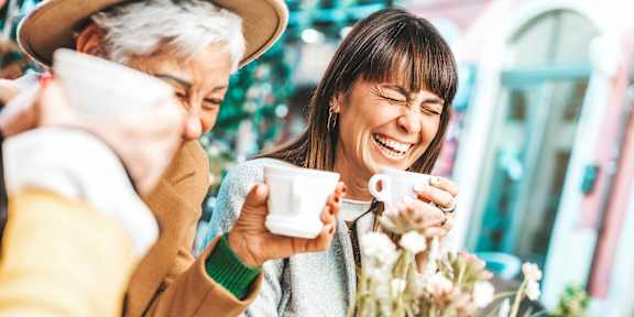 Two people enjoying a cup of coffee together.