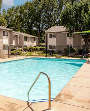 our apartments have a swimming pool with a fence around it