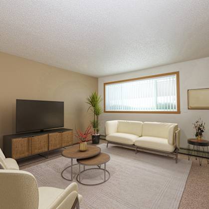 a living room with a couch and a tv