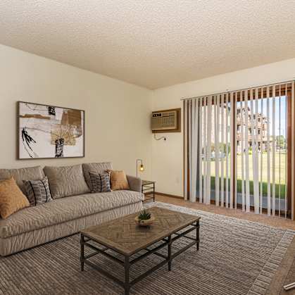 Grand Forks, ND Chandler 1866 | the living room of an apartment with a couch and a coffee table