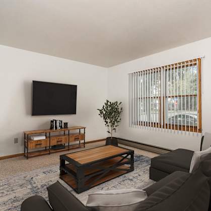 a living room with a couch and a coffee table