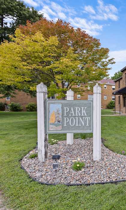 A brick building with a sign that says Park Point.
